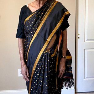 Never worn black and gold color Kanjivaran saree